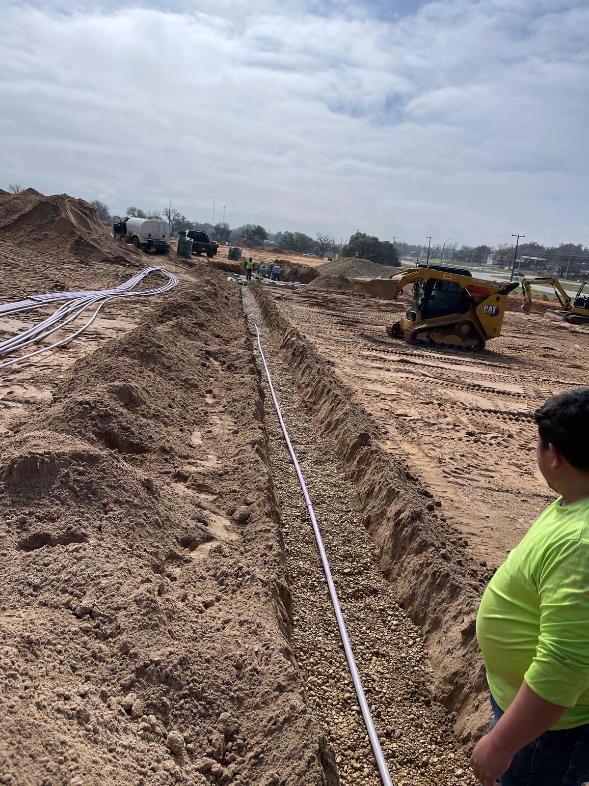 Septic trenching with equipment